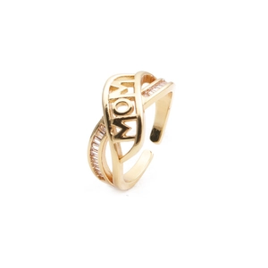 Detailed macro of golden MOM ring featuring hollow letters and baguette-cut zircon stones