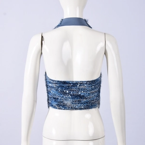 Detail of blue sequin gradient halter top showing open back design on mannequin