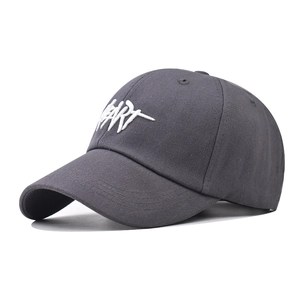 Detailed close-up of white 3D Heart embroidery on dark gray cotton baseball cap