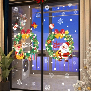Adesivi natalizi per vetrine con Babbo Natale e renne per una calda atmosfera festiva
