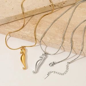 Ocean-themed seahorse pendant necklace in gold and silver stainless steel with snake chain