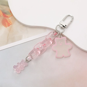 Detail showing pink gummy bear keychain with acrylic chain link and metal clasp
