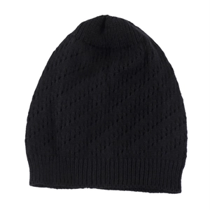 Detailed view of black knitted beanie featuring openwork texture and ribbed non-slip edge