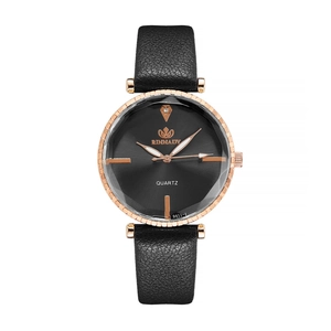 Minimalist quartz watch with rose gold case, black leather strap and rhinestone dial