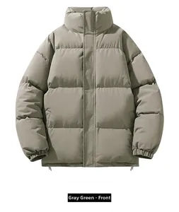 Detail view of grey-green quilted cotton jacket featuring windproof placket and ribbed cuffs