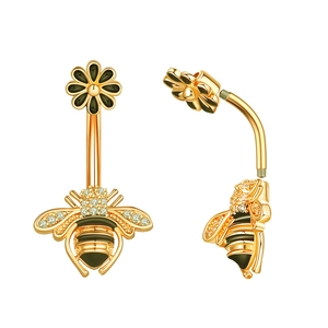 Detailed macro view of golden bee and flower belly ring with zircon stones