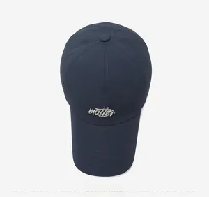 Top view of navy blue quick-dry baseball cap with white embroidery and breathable holes