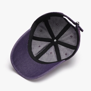 Internal structure of a purple baseball cap featuring 6-panel design and metal buckle