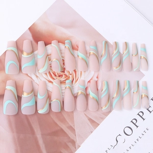 Matte long coffin press-on nails with mint green and metallic gold wavy line patterns
