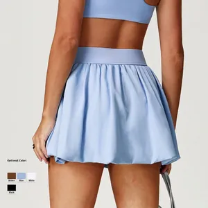 Light blue pleated tennis skirt with high waistband and built-in liner for sports