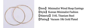 Detailed macro view of 18k gold plated titanium steel hoop earrings with round wire texture