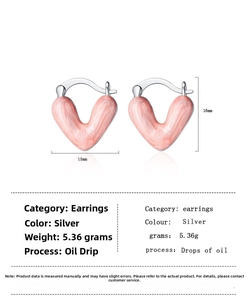 Detailed view of pink heart enamel clip-on earrings with precise dimensions and weight