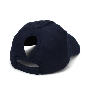 Detail of navy blue ponytail baseball cap showing rear opening and adjustable velcro strap