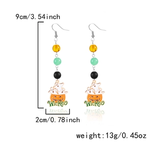 Macro view of Halloween pumpkin ghost drop earrings with 9cm size and 13g weight specs