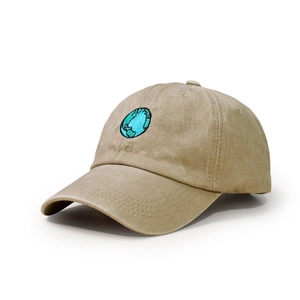Detail view of khaki washed cotton baseball cap with blue and green earth embroidery