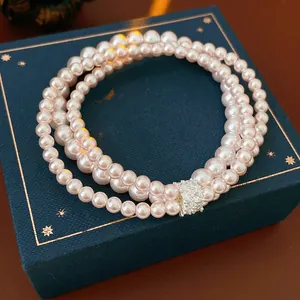 French vintage multi-layer pink pearl bracelet with a sparkling zircon-encrusted clasp
