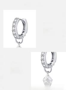 Macro detail of S925 sterling silver hoop earrings with sparkling 5A cubic zirconia drops
