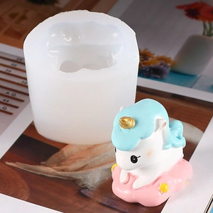 Detailed view of flexible unicorn silicone mold with a finished 3D resin craft