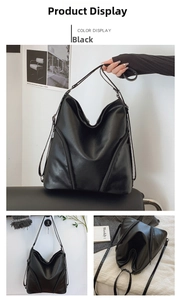 Detail view of black soft PU leather tote bag featuring stylish dual vertical zippers