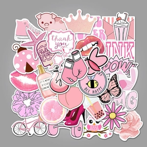 Detail of pink cute waterproof stickers with crown, lips and floral cartoon patterns