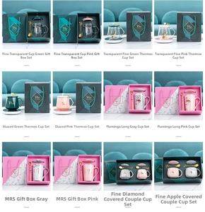 Nordic ceramic mug gift set collection with marble finish, lid, spoon, and warmer base