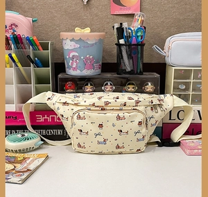 Detail of cream canvas fanny pack with cute cartoon dachshund prints and adjustable strap