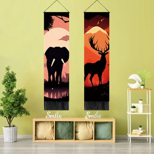 Vertical wall tapestries with forest animal silhouettes of elephant and deer with tassels