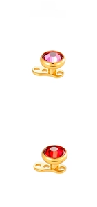 Macro detail of G23 titanium dermal anchor base with pink and red zircon stones