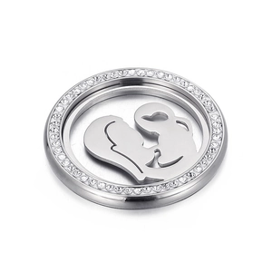 Detailed view of silver mother and child silhouette pendant with diamond halo