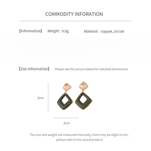 Detail view showing dimensions of geometric diamond earrings with copper and zircon material