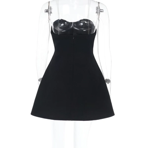 Detail view showing the back zipper closure on a black strapless backless mini dress