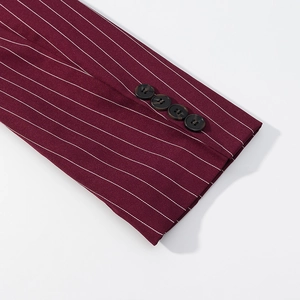 Detail of burgundy pinstripe blazer cuff featuring four dark brown buttons on sleeve