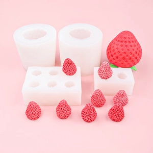 DIY strawberry silicone mold set for handmade candles and soaps on pink background