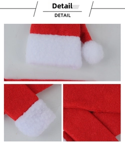 Detailed view of red and white felt Christmas wine bottle decoration scarf and hat set