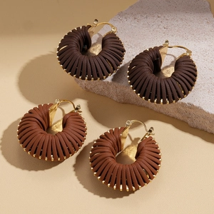 Maillard style retro brown leather woven gold hoop earrings on minimalist stone base