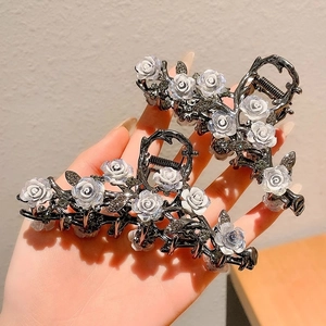 Elegant large black metal shark hair clips with white camellia flowers and sparkling crystals