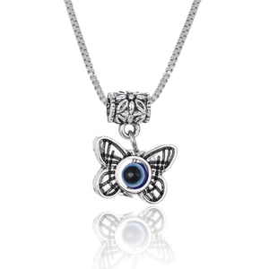 Detailed close-up of butterfly pendant with blue evil eye and hollow metal wings