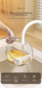 Macro view of 1L transparent rice washing filter cup with measurement scale and spout