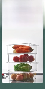 Close-up of stackable transparent food-grade PET storage boxes for fresh produce