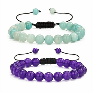 Detail of adjustable braided bracelets with 8mm turquoise and amethyst natural stone beads
