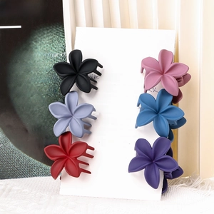 Set of six matte flower hair claw clips in various colors for elegant hairstyling