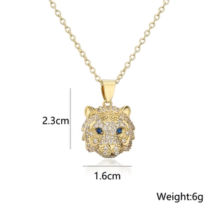 18K gold plated tiger head necklace with micro-paved zircons and blue gemstone eyes