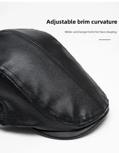 Detailed view of the foldable wide brim and textured black leather on the cap
