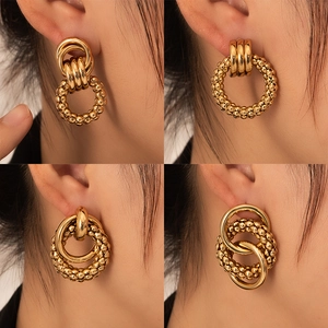 Set of four chunky 18K gold plated stainless steel hoop earrings for a vintage bold look
