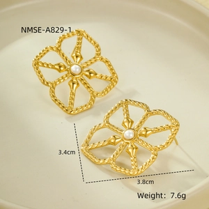 Detail of gold hollow flower pearl earrings with woven texture and size dimensions
