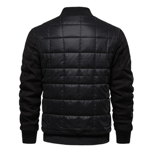 Rear view of black quilted bomber jacket showing diamond patterns and ribbed knit sleeves