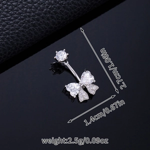 Macro view of silver butterfly belly ring with cubic zirconia showing 2.7cm size details