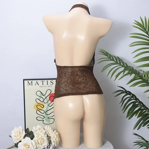 Detailed back view of sequined halter top in brown knit with open back design