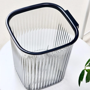 Minimalist transparent striped waste basket with elegant black rim for home and office