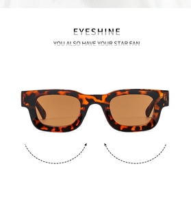 Close-up of vintage tortoise square sunglasses with warm brown translucent lenses